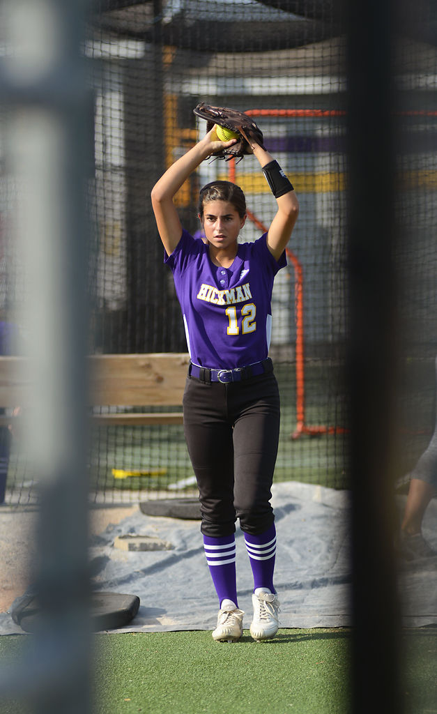 Abby Hurtado warms up before the softball game between Hickman Kewpies